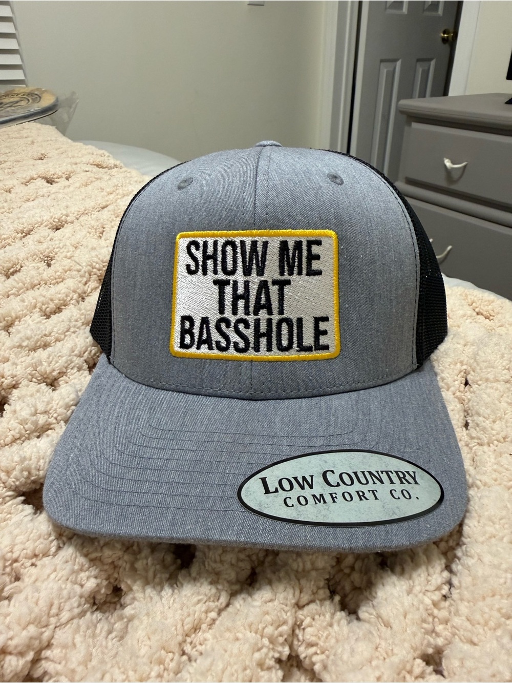 Low Country Comfort Co. 'Show Me That Basshole' Trucker Hat - Gray/Black/Yellow